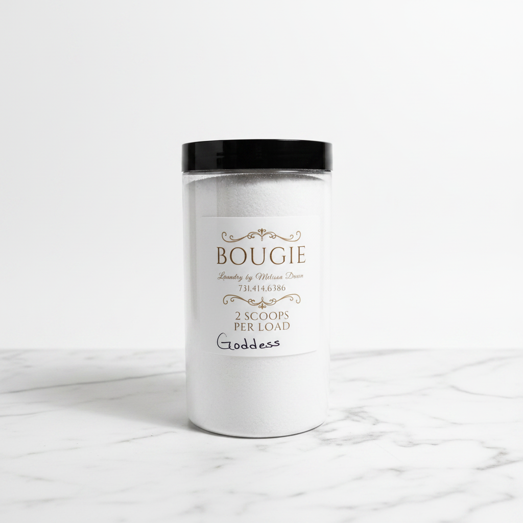 32 oz Bougie Laundry Soda in elegant clear jar with black lid on marble surface